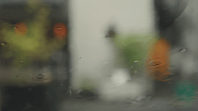 Blurred view through a rainy window