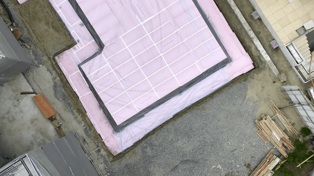 Construction site with pink insulation