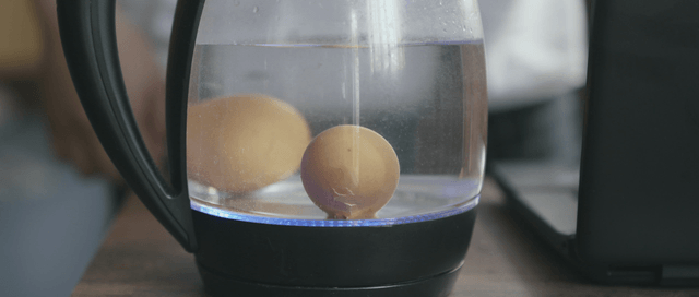 Eggs boiling in a kettle