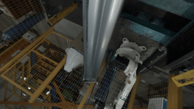 Robotic arm welding metal parts