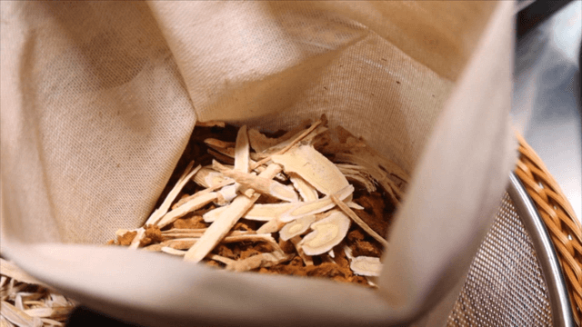 Herbal ingredients resting on a cotton cloth