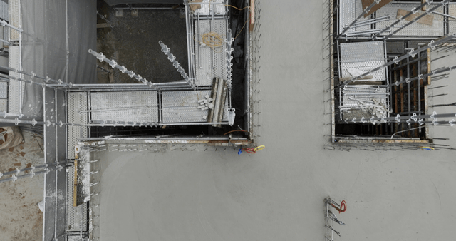 Construction site with scaffolding and materials