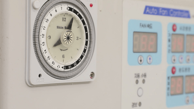Close-up of a timer and control panel