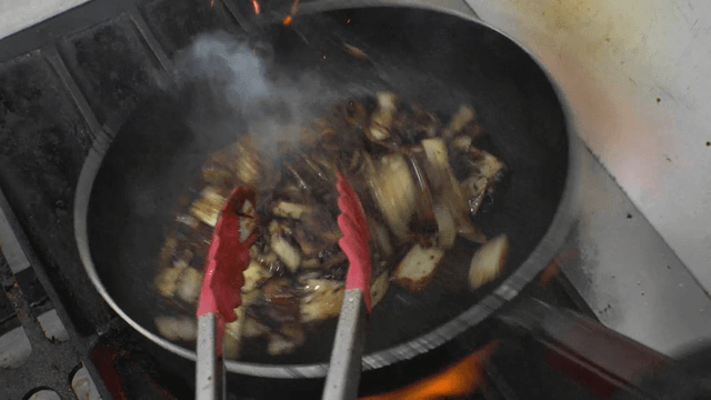 Jajangmyeon stir-fried in a flaming pan