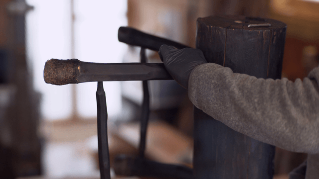 Wooden sculpture being polished
