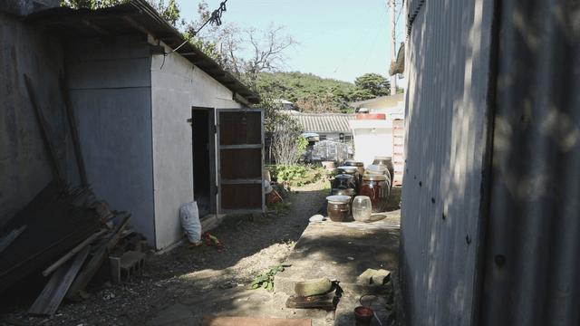 Rural housewith traditional jars