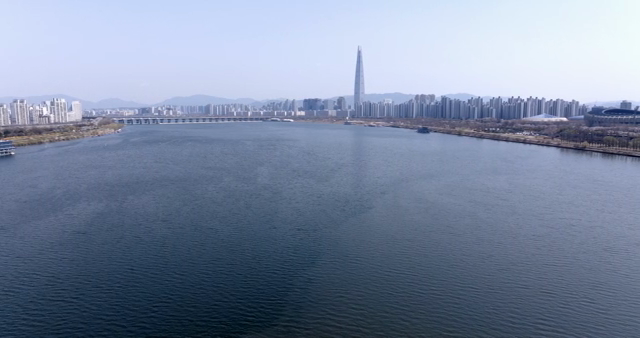 A river flowing through a modern city