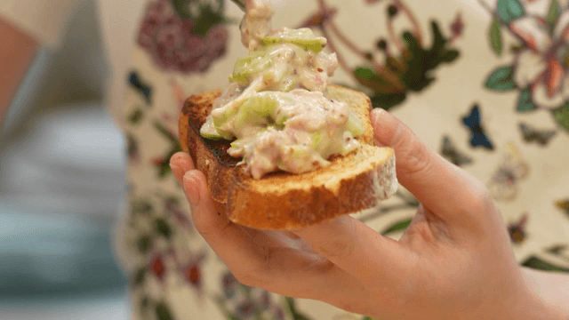 Tuna and cucumber salad placed on bread